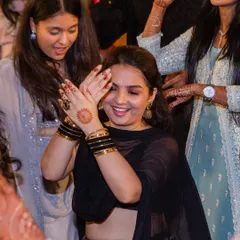 A candid moment of pure joy on the dance floor. This is the feeling we aim to create with our choreography, making sure everyone feels happy and lost in the rhythm.
