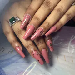 A full view of the classy star-adorned manicure, showing the clean shape and detailed artwork.