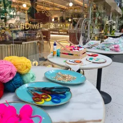 All the colorful supplies for a punch needle workshop are ready to go. You just need to show up and let your creativity flow.