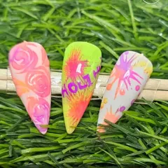 Get ready for Holi with our vibrant neon pigment nail art. This set features bright color splashes, the word "Holi," and neon floral designs that perfectly capture the festival's spirit.
