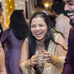 It's not just about the couple; it's about the celebration. We capture the infectious laughter and energy of your guests, preserving the atmosphere of joy that surrounds you on your sangeet night.