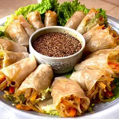 A beautiful platter of my Vietnamese summer rolls, filled with colorful, crisp vegetables and served with a delicious sesame dipping sauce. They are as beautiful as they are tasty.