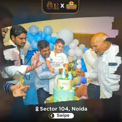 A heartwarming, multi-generational cake-cutting moment. Grandparents, parents, and the birthday boy all share in the celebration.