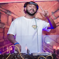 Rocking a Superman shirt behind the console. Sometimes you have to be a hero on the dance floor and save the night with the perfect track.