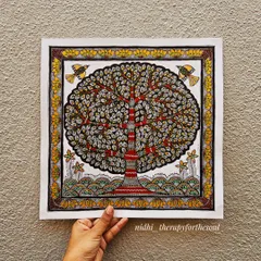The "Tree of Life" is a powerful symbol, and this is my take on it in the Madhubani style. I used a striking combination of brick red and shimmering gold that really catches the light, with intricate patterns filling every leaf and branch. This original piece is available for sale.