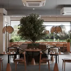 For this project, we brought nature indoors in a big way. The central tree serves as a stunning focal point, creating a serene atmosphere throughout the cafe. We designed the layout to ensure that no matter where you sit, you have a connection to the outdoors, enhanced by the large window flooding the space with natural light.
