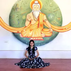 A closer look at the details of the rishi mural. Every element in the background circle represents a different aspect of knowledge and spirituality, painted to create a powerful meditative focus.