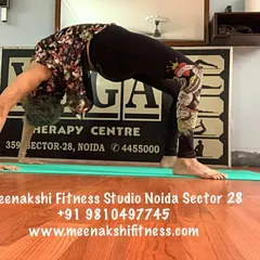 A side view of my Wheel Pose. I focus on pressing firmly through the hands and feet to create space in the spine.