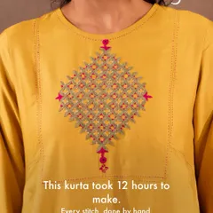 The beauty of our clothing lies in the time and skill invested by our artisans. This particular kurta took over 12 hours of meticulous hand embroidery, a testament to the slow, intentional process that makes each garment a piece of wearable art.