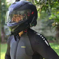 A close-up of my riding gear. I use an AGV helmet, BluArmor communicator, GoPro for recording, and a Motowolf armored jacket. Being fully equipped is essential.