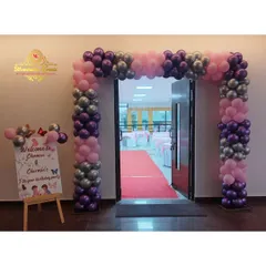 Another view of the beautiful butterfly-themed entrance arch.