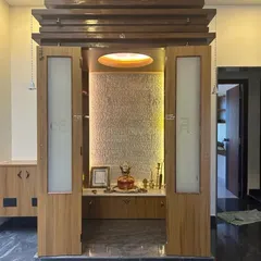 A duplicate of image 124, showing the full view of the modern pooja unit with its tiered wooden top.