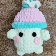 A cute little toy made with soft velvet yarn. The texture is very fluffy and gentle, perfect for a baby's first toy.