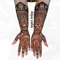 A full bridal arm design featuring classic Rajasthani elements. Notice the detailed palace architecture at the top, the royal elephant procession, and the delicate peacock and lotus motifs integrated into the palms.