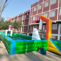 This is our inflatable soapy football pitch, ready for action. It's a super fun game for older kids and even adults at corporate events or parties. The soft, slippery surface makes for a hilarious and safe match.
