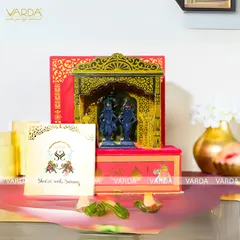 A divine wedding invitation featuring a 3D temple arch with idols of Shri Vitthal and Rukmini. The red and gold box is adorned with floral motifs and comes with a personalized invitation card, perfect for a traditional Maharashtrian wedding.