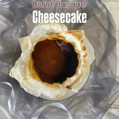 My Burnt Basque Cheesecake, with its signature rustic, caramelized top. It's intentionally burnt to create a deep, complex flavor that contrasts with the creamy interior.