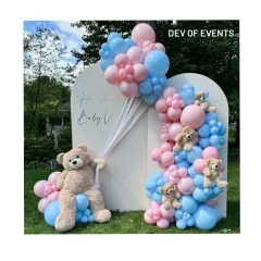 Celebrating a new arrival with a classic "He or She" baby shower theme. I designed this outdoor backdrop using pink and blue organic balloon garlands and adorable teddy bears, including a life-sized one, to create the perfect sweet and playful atmosphere.