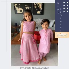 For this adorable brother and sister duo, I created a coordinated ethnic set in a lovely shade of pink. The girl's lehenga choli features delicate embroidery that complements her brother's simple yet smart cotton kurta pajama.