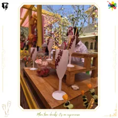 An artfully presented cocktail with a dragon fruit garnish and custom stirrer. These details elevate the drink and enhance the visual appeal of the bar.