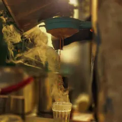 Chasing the golden hour with my phone. This shot of chai being poured, with the steam catching the light, is a perfect example of finding beauty in everyday moments.