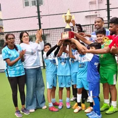 This is the moment we strive for. Our U10 champions celebrating their hard-earned tournament victory, lifting the trophy high. We believe in building a winning mentality through teamwork and dedication.