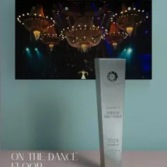We won an award for this 'On the Dance Floor' shot. The image of the bride under magnificent chandeliers captures the grandeur and energy of a wedding celebration.