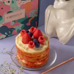 This isn't just a candle; it's a celebration. My handcrafted berry cake candle is a true showstopper, designed to look as delicious as it smells and add a touch of playful charm to any occasion.