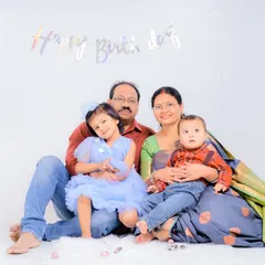 It's wonderful to include grandparents in these milestone shoots. This is a complete family portrait with the birthday boy and his sister.