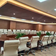 This is a view of the large-scale conference room we delivered for NBCC, a Government of India enterprise. The project highlights our ability to furnish expansive, high-stakes environments with custom conference tables and uniform executive seating.