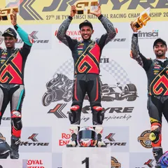 This is the culmination of a successful race weekend at the Royal Enfield GT Cup. I am on the top step of the podium, celebrating a hard-fought victory with my fellow competitors.