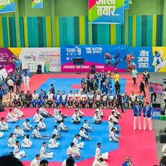 A wide view of the competition arena at the 37th National Games, where athletes and officials gather. Participating in an event of this scale is a privilege and a significant responsibility.