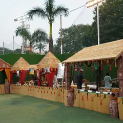I can transform any space with themed catering. Here, I created an entire village-themed food festival for an outdoor event, complete with rustic stalls and traditional decor to offer a truly immersive culinary journey.