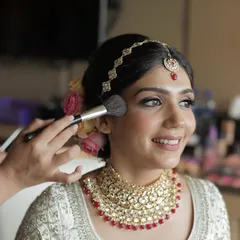 A close-up of the makeup process for Kanika. A light touch of blush and perfectly defined eyes create a look that is both traditional and modern for the contemporary bride.