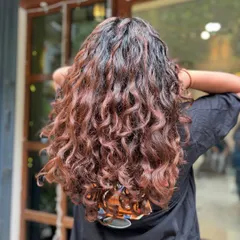 The back of her hair, showing off the beautiful definition and color. This is what happens when you "fix" your curls with the right knowledge.