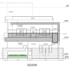 A technical elevation drawing of a residential building. This plan provides precise measurements and specifications for the building's exterior, including window placements, balcony railings, and material finishes.