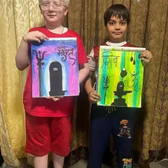 Here are two of my students showing their finished artwork inspired by Lord Shiva. Each piece uses a different color scheme and composition to express their devotion through art.