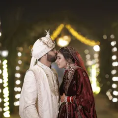 A perfect moment captured. For this bride's wedding, I created a timeless look with a velvet maroon lehenga, focusing on a glowing complexion and defined eyes that photographed beautifully.