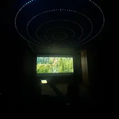 A look at a completed 7.2.4 Dolby Atmos home theater, delivered in just 15 days. The custom fiber optic ceiling creates a magical starlit sky, adding another layer of immersion to your movie-watching experience.