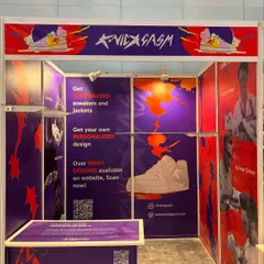 This is our standard stall setup for conventions and pop-ups. It features bold, full-wall graphics, clear service menus, and our branding prominently displayed to attract and inform attendees.