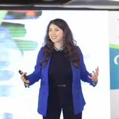 A powerful first impression is the first step to effective communication. Here I am on stage, sharing insights on how to build confidence and connect with any audience, whether it's in a boardroom or at a conference.