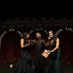 On stage with the happy couple, getting ready for a fun game. These interactive moments are what make a sangeet night truly personal and entertaining for everyone.