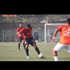 A senior player taking a powerful shot on goal during the Republic Cup Finals. This is the level of technique and confidence we expect from our players.