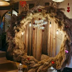 Another look at the pampas grass Valentine's Day ring. This unique decor piece is perfect for restaurants or events wanting a trendy and stylish photo opportunity.