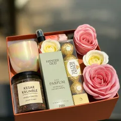 A box full of love for the queen of our hearts. This Mother's Day hamper features Kesar Krumble from Arq Mithai, a Zara perfume, Ferrero Rocher, and Forest Essentials rosewater.