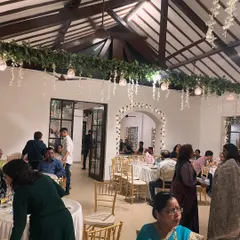 The dining area at an event we catered at Pioneer Hall, Bandra. We work within the venue's ambiance to ensure our setup complements the overall decor and atmosphere.