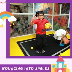 Bouncing into smiles on our enclosed trampoline! This area includes a basketball hoop for extra high-flying fun.