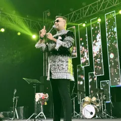 On stage for a grand destination wedding, commanding the show. This is where I bring the polish and professionalism needed for large scale events, ensuring a seamless flow and keeping the spotlight on the moments that matter.