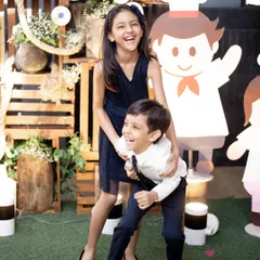 The pure, uninhibited joy of childhood. I love capturing siblings in their element, whether they are sharing a secret or bursting into laughter. These candid portraits are all about freezing the genuine energy and bond that they share.