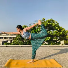 Natarajasana (Dancer's Pose) is a beautiful expression of balance and openness. Here, I'm practicing on the rooftop, connecting the movement with the open sky.